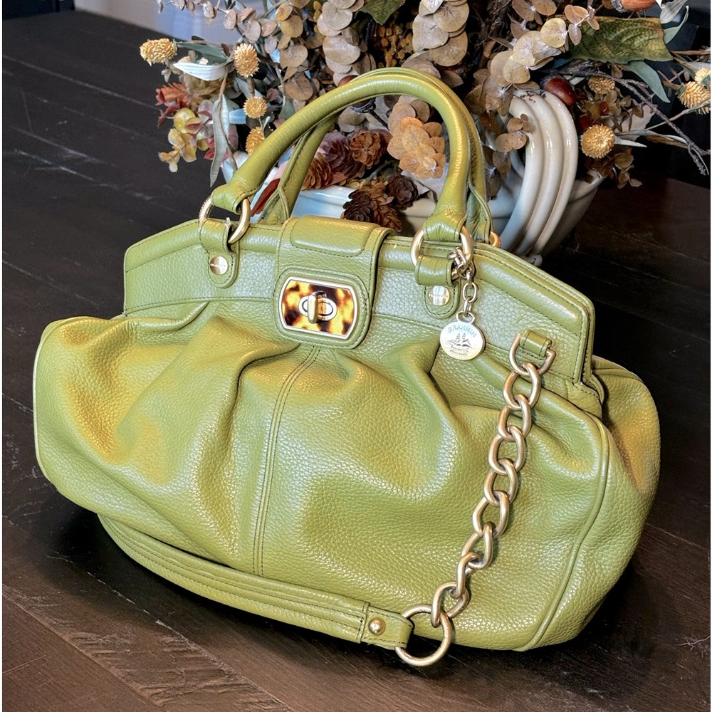 Olive leather Brahmin slouchy purse with tortoise shell latch.
